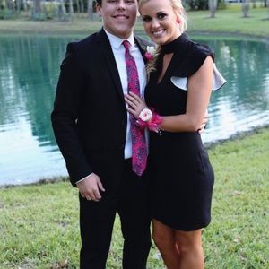 Black dress open back with one ruffle on shoulder